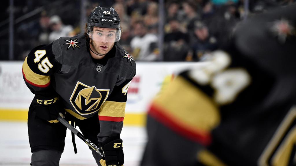 In this photo from NHL.com, Vegas Golden Knights defenseman Jake Bischoff readies his stick on the ice for a face-off at T-Mobile Arena