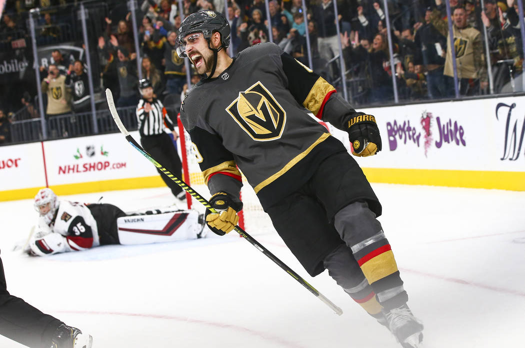 Vegas Golden Knights player Alex Tuch cheers after scoring a goal against the Arizona Coyotes at home during a Black Friday game