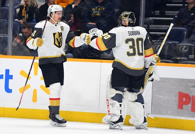 Mark Stone and Malcolm Subban, players for the Vegas Golden Knights, share a fist bump during their game against the Nashville Predators on November 27, 2019