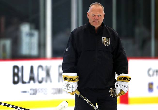Gerard Gallant stands on the ice during an away practice with the Vegas Golden Knights